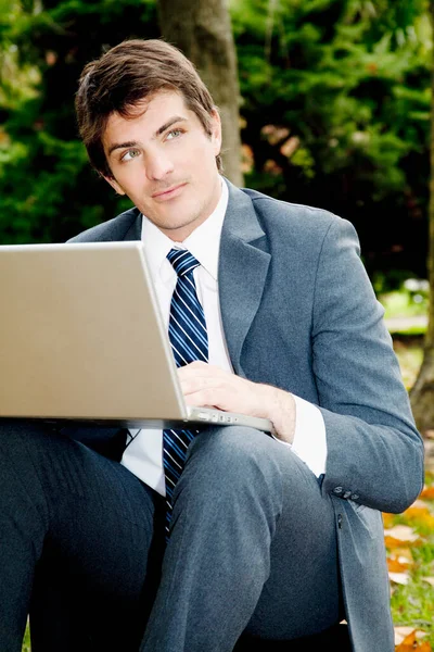 Young Businessman Sitting Bench Working Laptop Stock Picture