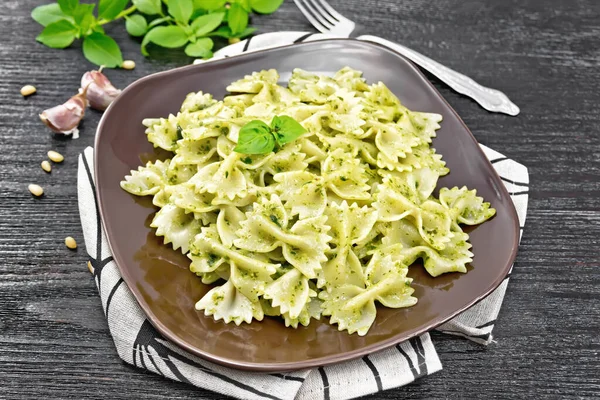 Farfalle Pasta Pesto Basil Plate Towel Dark Wooden Board — Stock Photo, Image