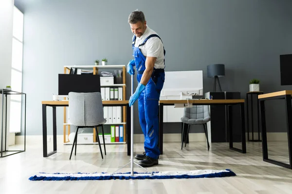 Male Janitor Mopping Floor Face Mask Office — Stock Photo, Image