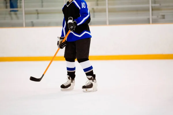 Hockeyspelare Aktion — Stockfoto
