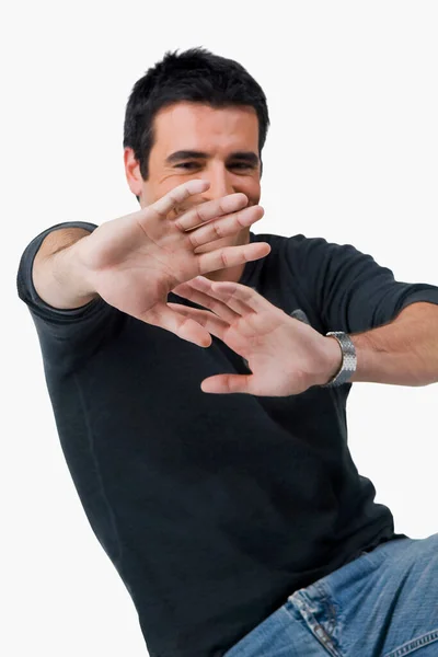 Jonge Man Met Zijn Handen Witte Achtergrond — Stockfoto