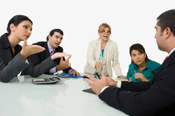 Grupo Empresarios Discutiendo Documentos Mirando Cámara —  Fotos de Stock