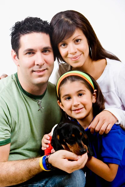 Portrait Girl Holding Puppy Her Mother Father — Stock Photo, Image