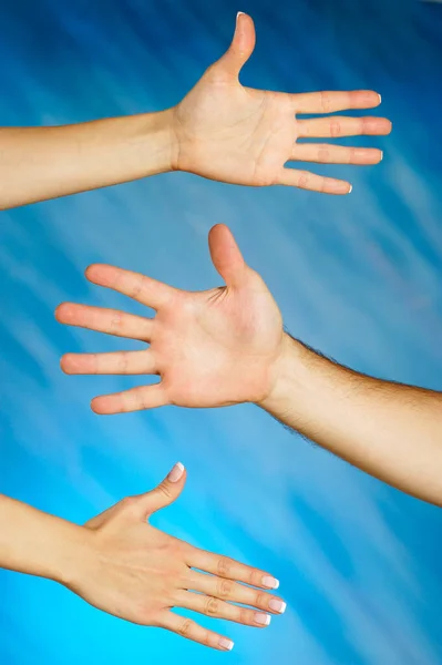Χέρι Γυναίκας Και Γυναικεία Χέρια Μπλε Φόντο — Φωτογραφία Αρχείου