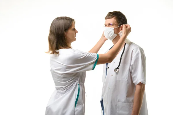 Nurse Puts Medical Mask Doctor Face Glasses — Stock Photo, Image