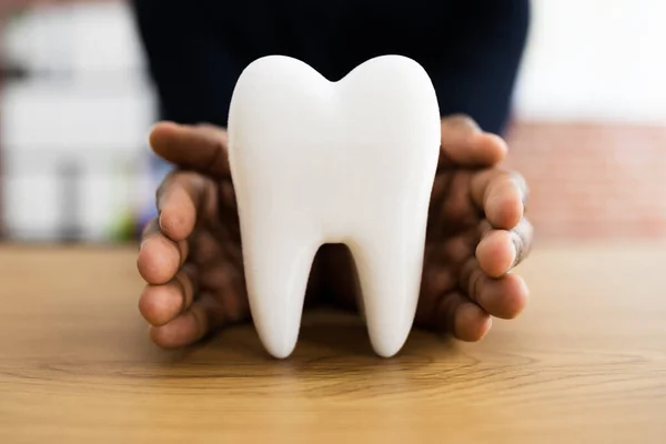 Dental Tooth Insurance And Replace Enamel Service. African American Man