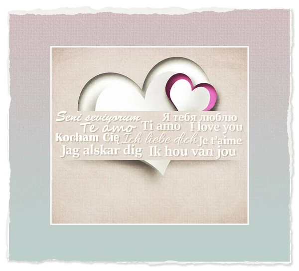 Miluju Více Jazycích Srdce Papírových Proužcích Pastelově Růžovém Pozadí Valentines — Stock fotografie