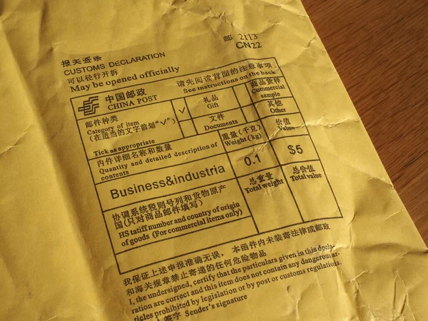 Chinese customs declaration and postage meter on a foreign parcel from china. (Translation: see English text below each Chinese text)