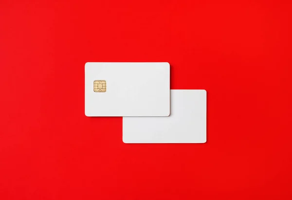 Fotografie Dvou Prázdných Kreditních Karet Červeném Papíře Pozadí Bílé Bankovní — Stock fotografie