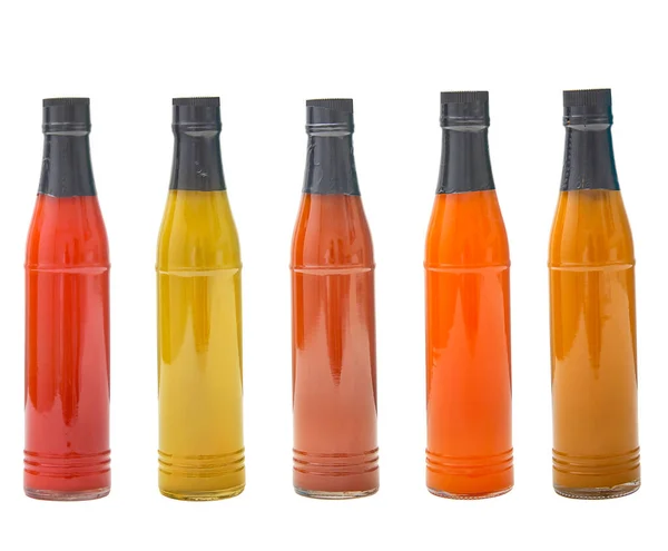 Set Glazen Flessen Met Verschillende Heerlijke Sauzen Geïsoleerd Witte Achtergrond — Stockfoto