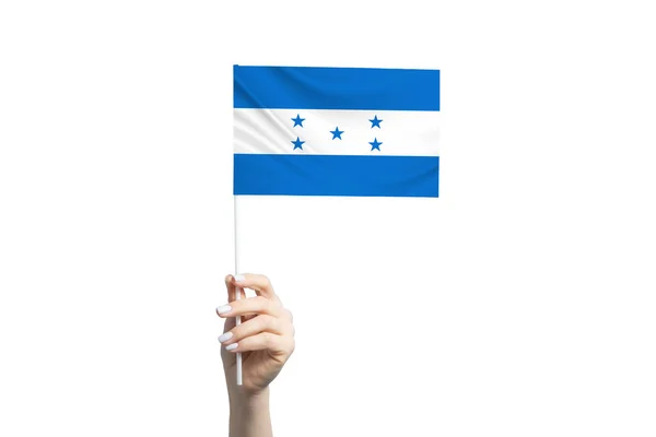 Bela Mão Feminina Segurando Bandeira Honduras Isolada Fundo Branco — Fotografia de Stock