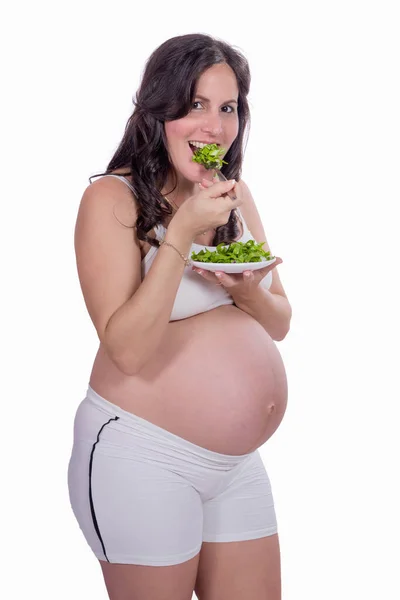 Uma Mulher Grávida Com Comer Salada Vestindo Roupas Brancas — Fotografia de Stock