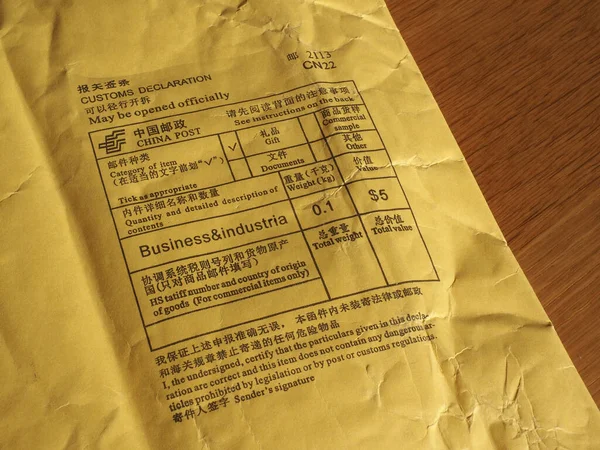 Chinese customs declaration and postage meter on a foreign parcel from china. (Translation: see English text below each Chinese text)