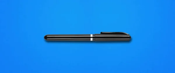 Черная Войлочная Ручка Фоне Синего Баннера — стоковое фото