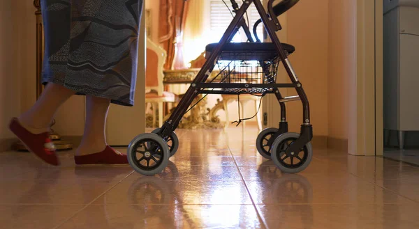 Elderly Woman Walks Indoors Walker Detail Legs Slow Motion Scene — Stock Photo, Image