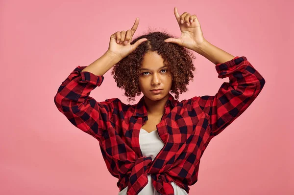 Young Woman Shows Horns Pink Background Emotion Face Expression Female — Foto de Stock