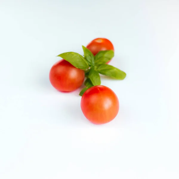 Red Cherry Tomatoes Green Basil White Background High Quality Photo — Stock Photo, Image