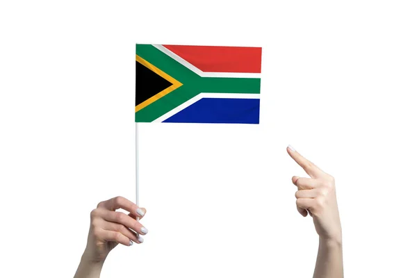 一只漂亮的女手举着一面南非国旗 另一只手拿着她的手指 被白色的背景隔开了 — 图库照片