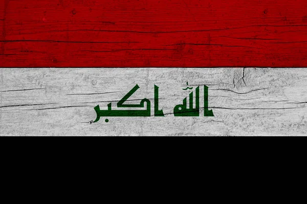 木製の背景に描かれたサウジアラビアの国旗です — ストック写真