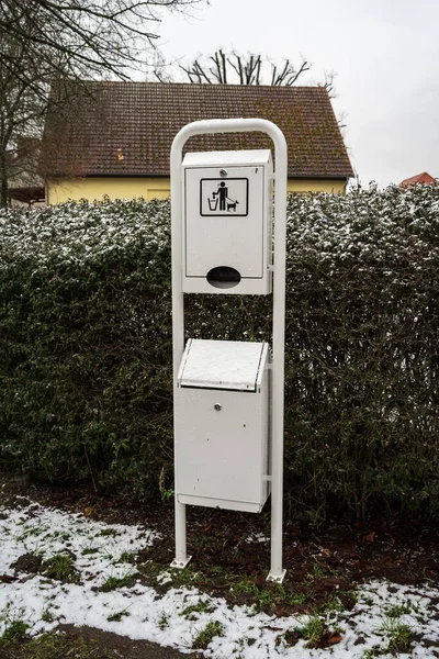 Public point of delivery of free bags and disposal of dog feces.