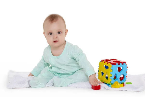 Sweet Baby Wearing Green Romper Suit Plays Children Toy White — Stock Photo, Image