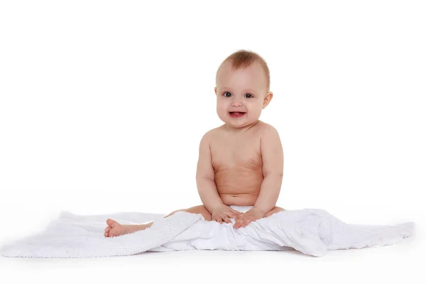 Das Kleine Baby Windel Sitzt Auf Einem Karo Auf Weißem — Stockfoto