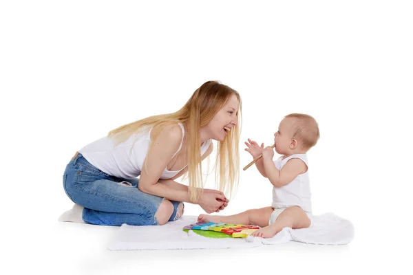 Young Woman Her Daughter Playing Developing Music Toy White Background — Stock Photo, Image
