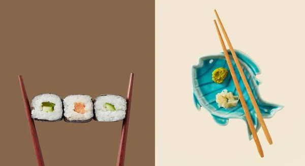用三块海草包裹的筷子 配上米饭和鳄梨 配上蓝鱼形的酱汁盘 — 图库照片