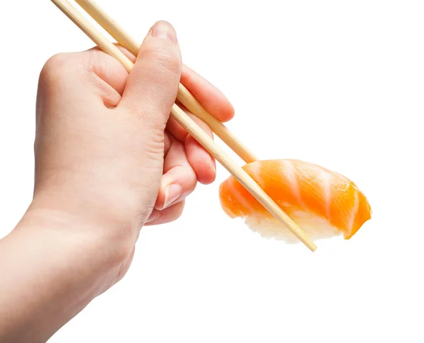 Mano Femminile Con Bacchette Legno Tiene Sake Nigiri Sushi Con — Foto Stock