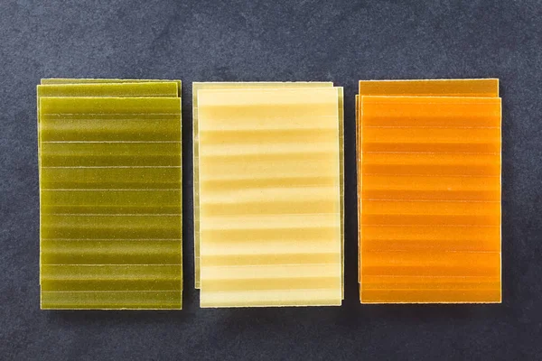 Raw Tri Color Lasagne Pasta Sheets Photographed Overhead Slate — Stock Photo, Image