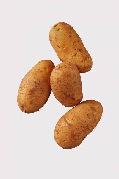 Vier Gesunde Frische Bauernkartoffeln Spuds Tater Oder Tatties Isoliert Auf — Stockfoto