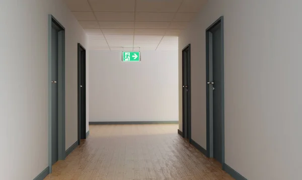 Corridor with an escape route and shield for the emergency exit to the right