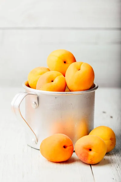 Mellow Apricots Metal Mug Light Wooden Surface — Stock Photo, Image