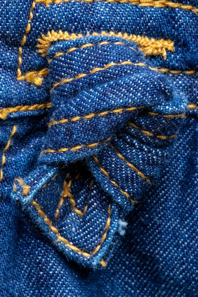Fondo Decoración Mezclilla Primer Plano Del Nudo Azul Jeans Nudo —  Fotos de Stock