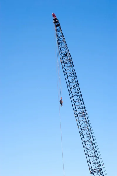 Tall Industrial Crane Clear Blue Sky Cables Hook Hanging Top — Stock Photo, Image