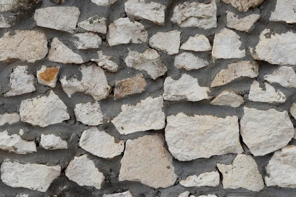 Naturlig White Grov Sten Blandat Med Mörkgrå Cementvägg Bakgrundsyta Närbild — Stockfoto