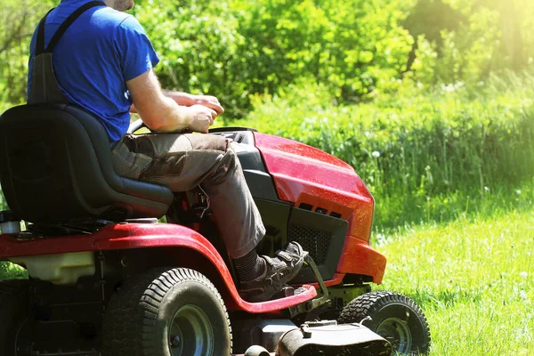 Gardener Driving Riding Lawn Mower Garden Stock Picture