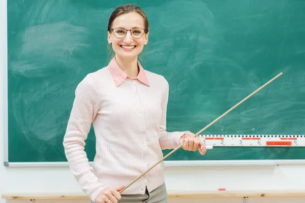 Friendly Teacher Standing Front Blackboard Class Pointer Hand — Stock Photo, Image