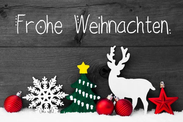 ドイツの書道Frohe Weihnachtenはメリークリスマスを意味します ボール トナカイ 木や雪の結晶のような赤いクリスマスの装飾 雪と灰色の木製の背景 — ストック写真