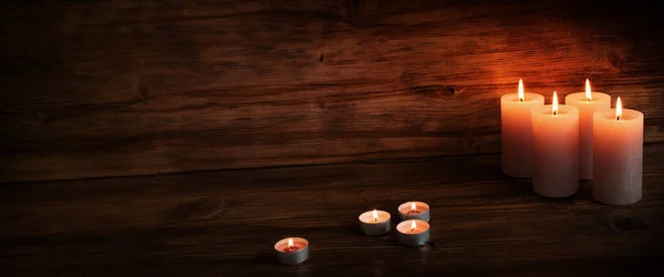 Luminous Candles Darkness Wooden Background Keepsake Place Text — Stock Photo, Image