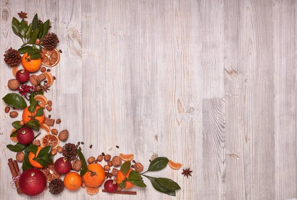 Festive Still Life Tangerines Nuts Spices Christmas Decorations Wooden Light — Stock Photo, Image