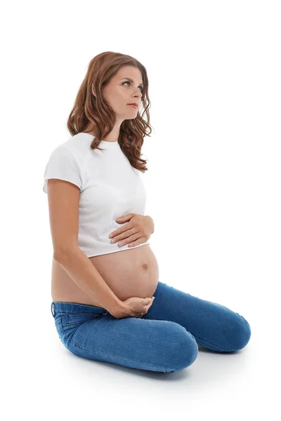 Zwanger Vrouw Met Een Baby Zitten Een Witte Achtergrond — Stockfoto