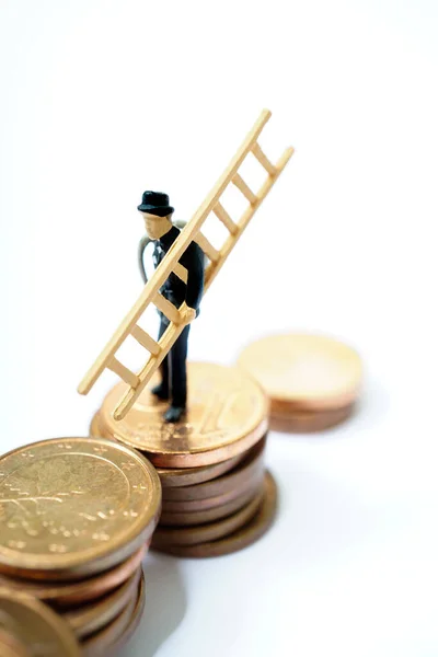 Lucky charm, chimney sweep with ladder stands on coins as a symbol of happiness for prosperity and wealth