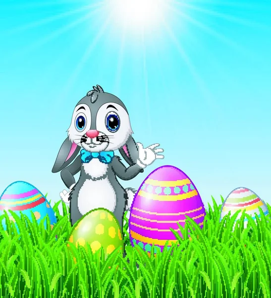 Conejo Pascua Dibujos Animados Ondeando Con Huevos Pascua Fondo Hierba — Vector de stock