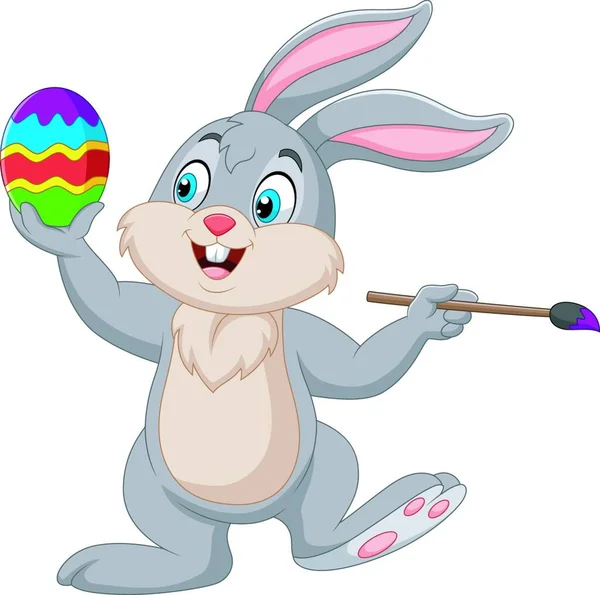 Conejo Dibujos Animados Pintando Huevo Pascua — Vector de stock