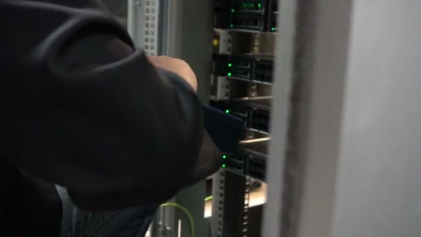 Asian Engineer Working Server Room Maintenance Checking Technical Data — 图库视频影像