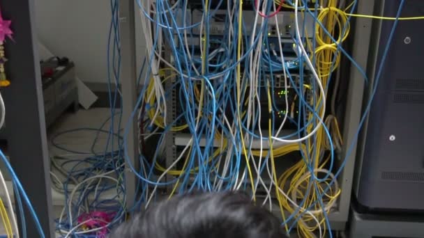 Asian Engineer Working Server Room Maintenance Checking Technical Data — 图库视频影像