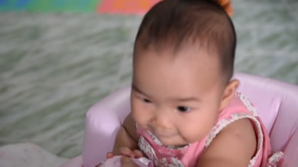 Mother Feeding Cute Asian Baby — Stock Video