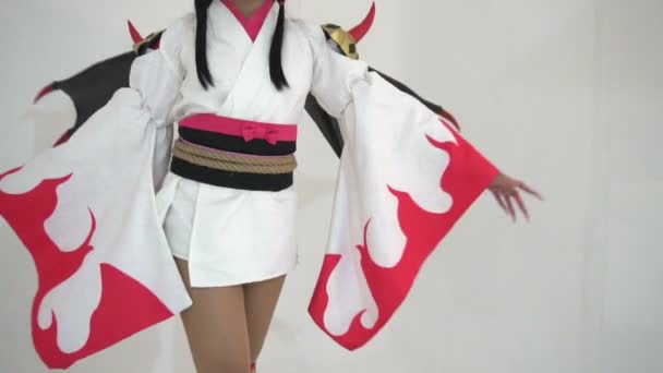 Beautiful Asian Girl Wear Cosplay Game Animation Posing White Background — 图库视频影像