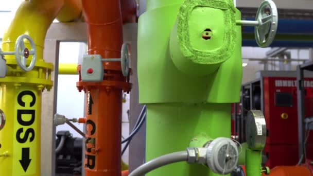 Asian Maintenance engineer at the waste water management system of a huge factory,maintenance checking technical data of heating system equipment,Thailand people — Stock Footage Asian Maintenance Engineer Waste Water Management System Huge Factory Maintenance Stock Footage